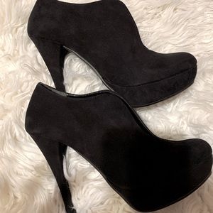 High heeled shoes